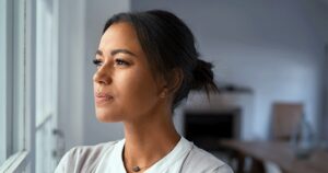 Young woman thinking about STI symptoms