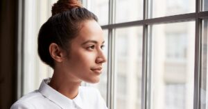 Woman feeling stressed from finding out she's pregnant