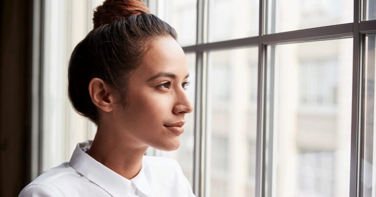 Woman feeling stressed from finding out she's pregnant